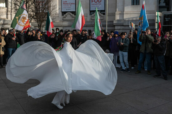 A woman dancing performing a traditional dance during a