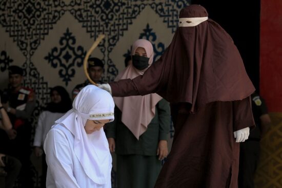 The First Islamic Sharia Officer Was Publicly Caned In Banda Aceh